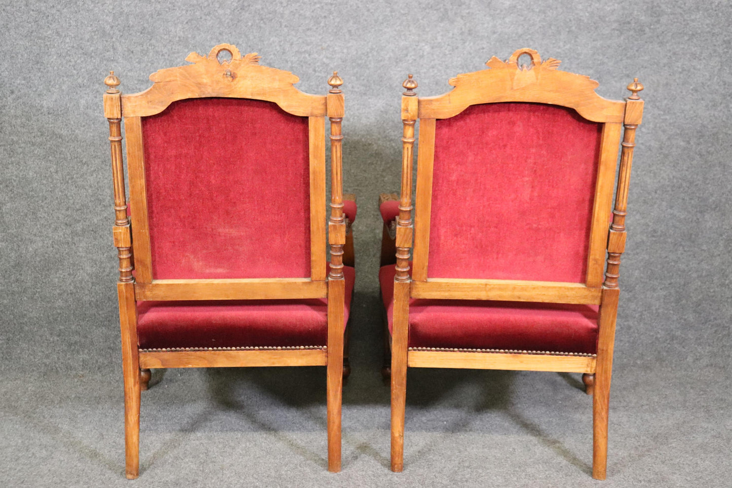 Pair of Carved Walnut Burgundy Velvet Louis XVI Fauteuil Armchairs, circa 1920