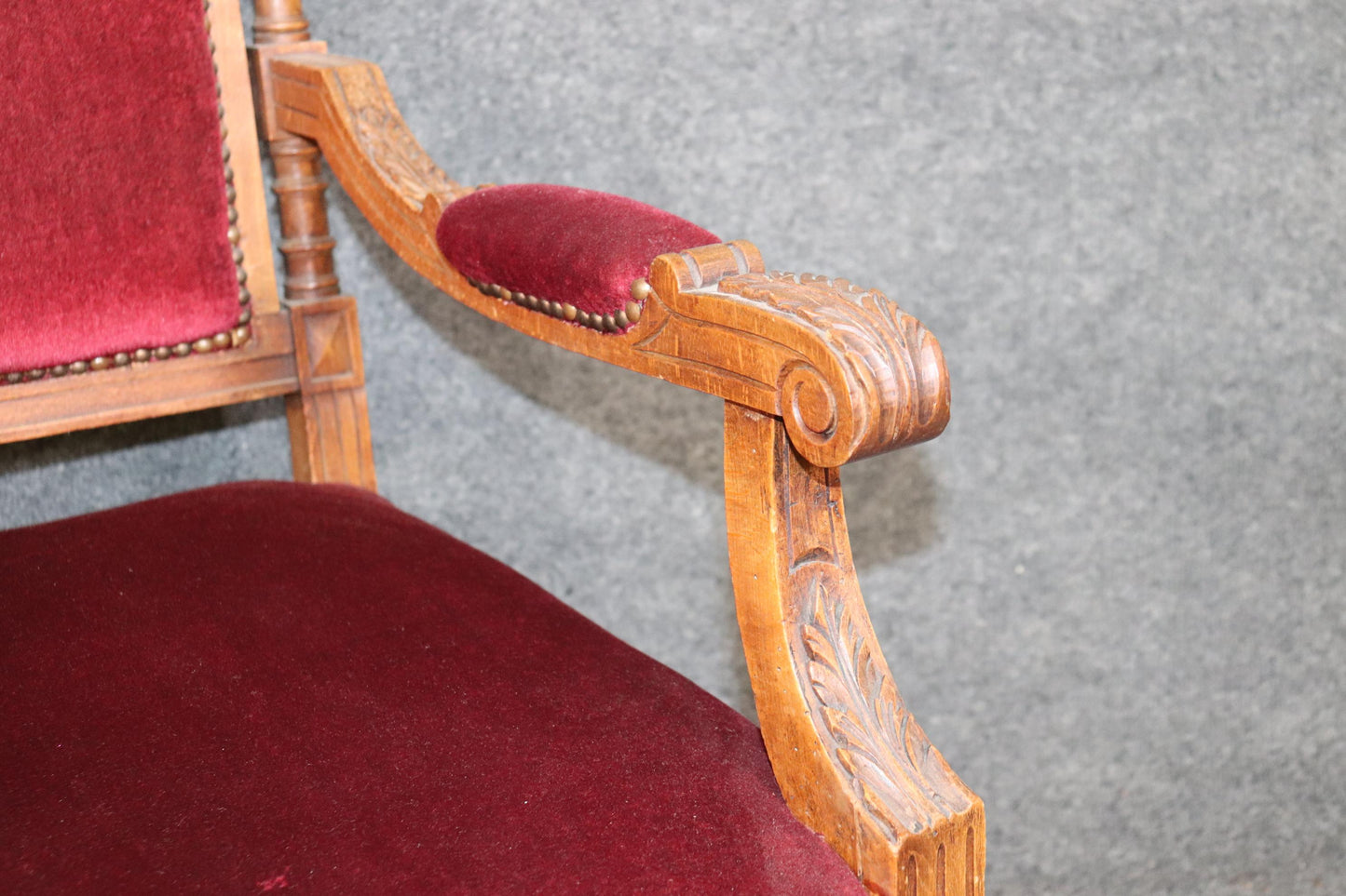 Pair of Carved Walnut Burgundy Velvet Louis XVI Fauteuil Armchairs, circa 1920