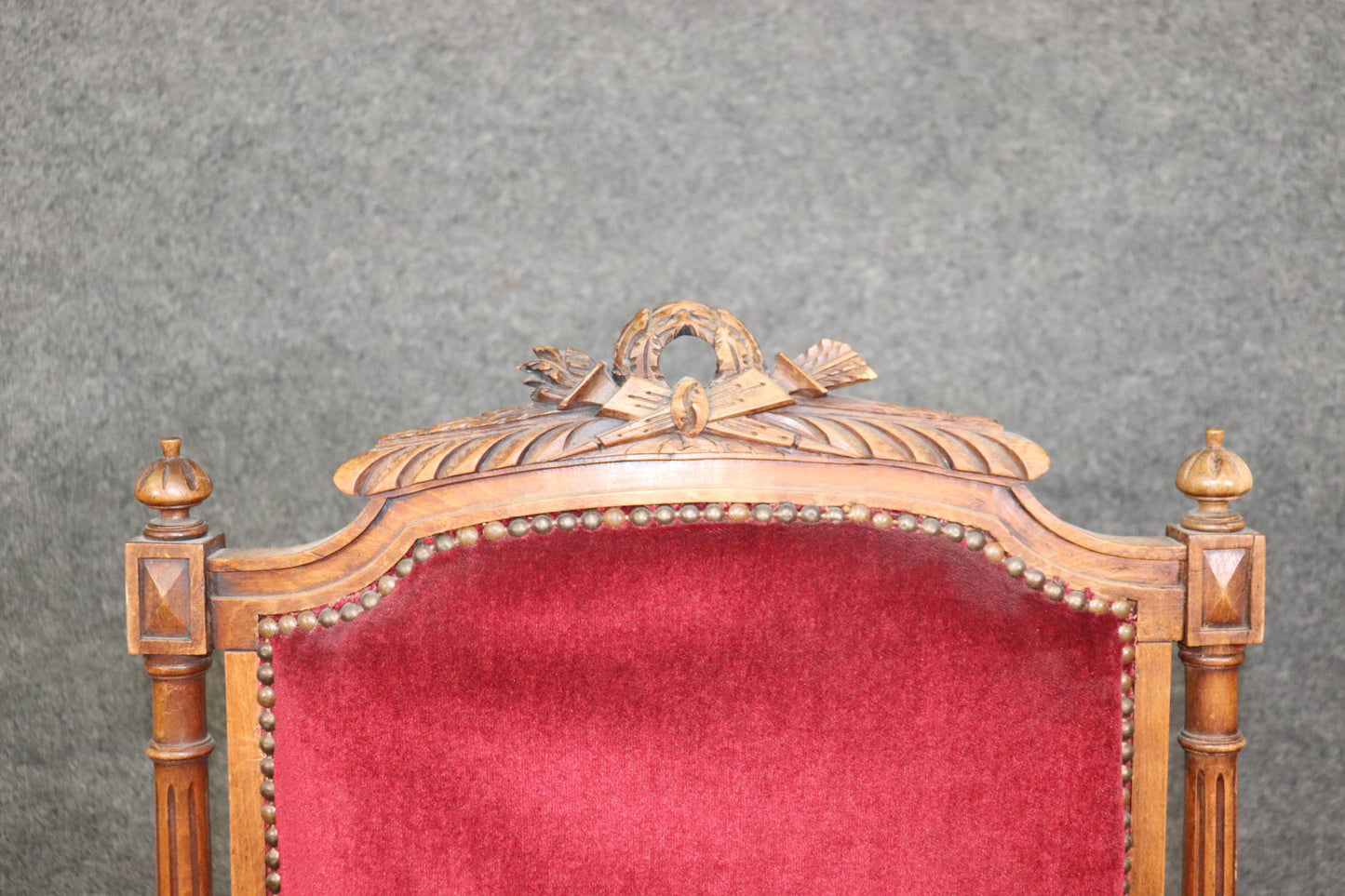 Pair of Carved Walnut Burgundy Velvet Louis XVI Fauteuil Armchairs, circa 1920