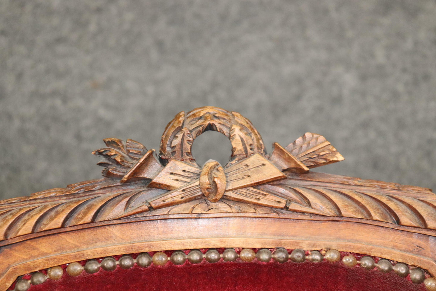 Pair of Carved Walnut Burgundy Velvet Louis XVI Fauteuil Armchairs, circa 1920