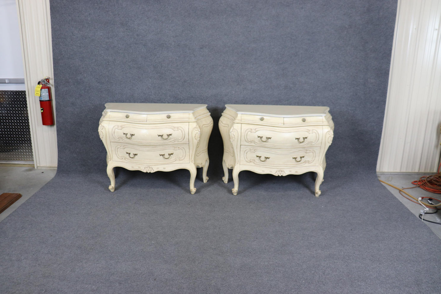 Pair of Fantastic French Rococo Bombe Distressed Off-white Painted Commodes