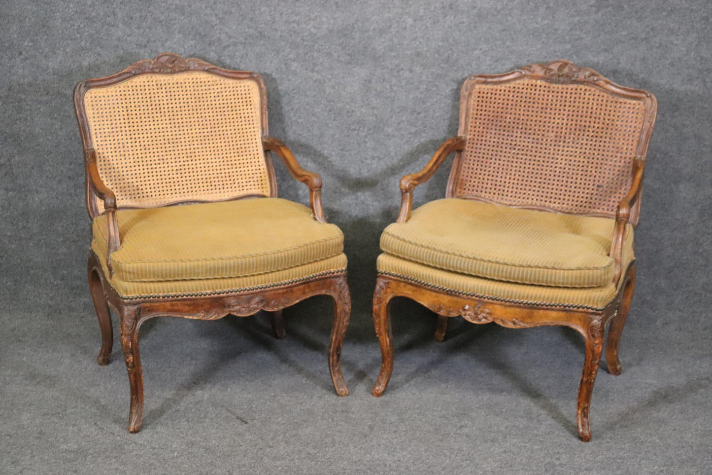 Pair of Cane Back French Louis XV Armchairs