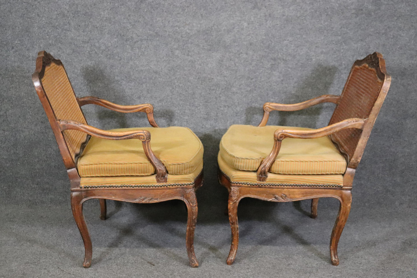 Pair of Cane Back French Louis XV Armchairs