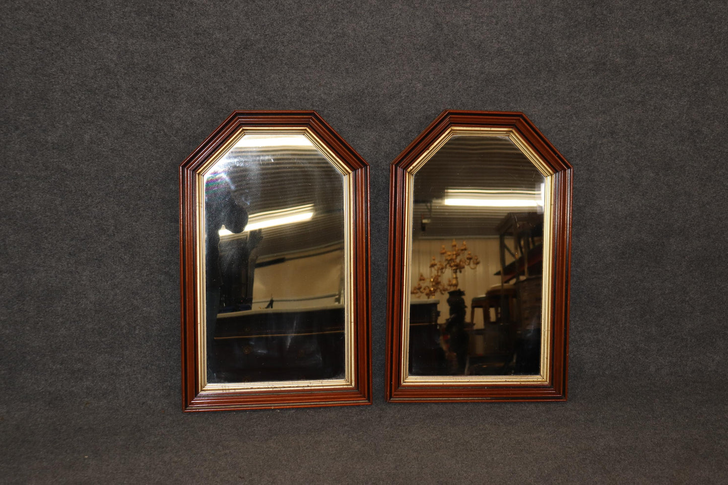 Pair of Highly Molded Walnut Geometric Pseudo Gothic Style Gilded Wall Mirrors