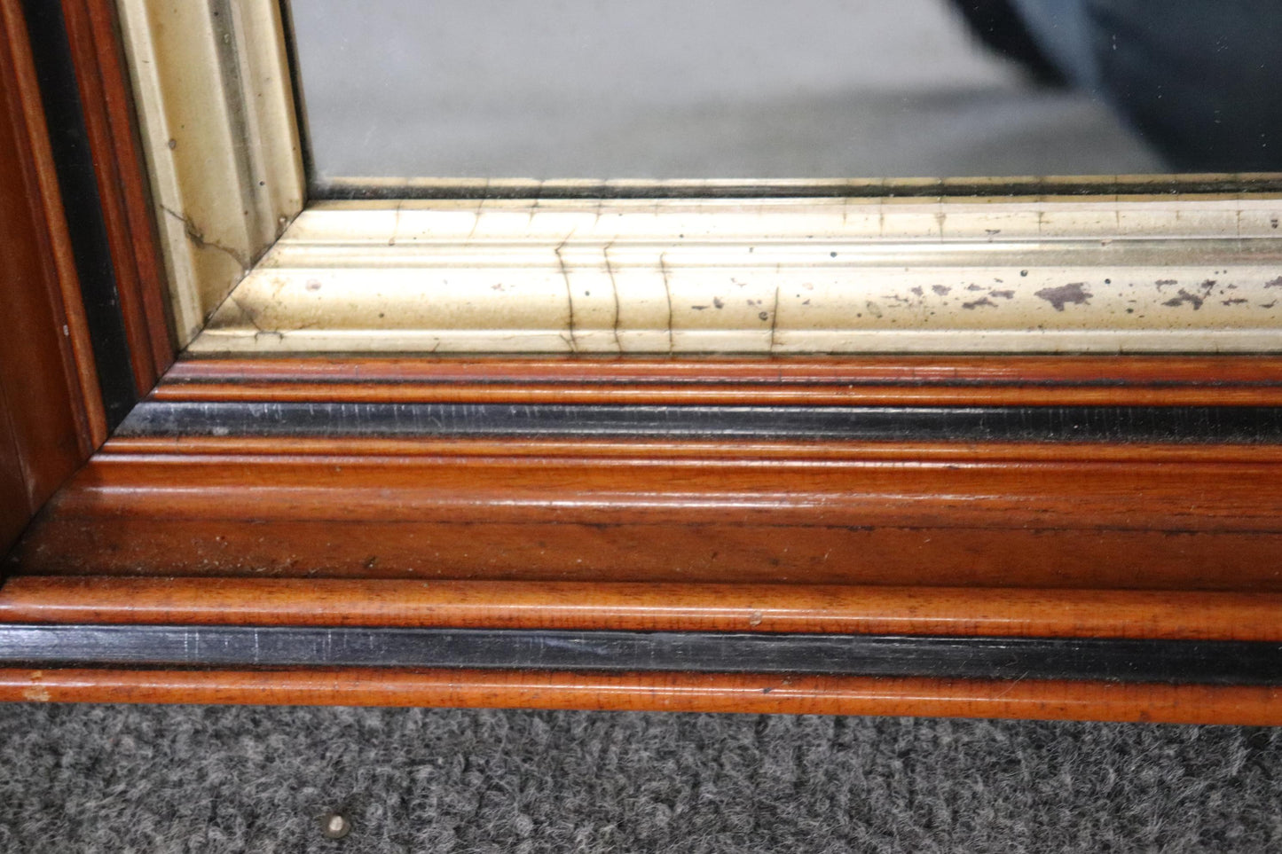 Pair of Highly Molded Walnut Geometric Pseudo Gothic Style Gilded Wall Mirrors