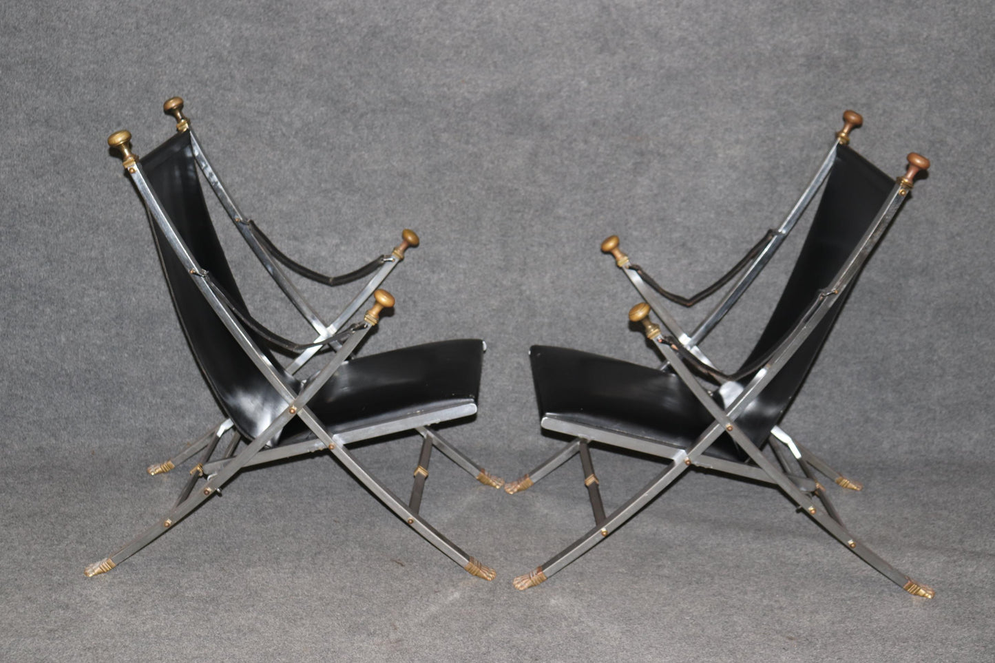 Pair of Maison Jansen Brass and Steel Paw Footed Campaign Chairs