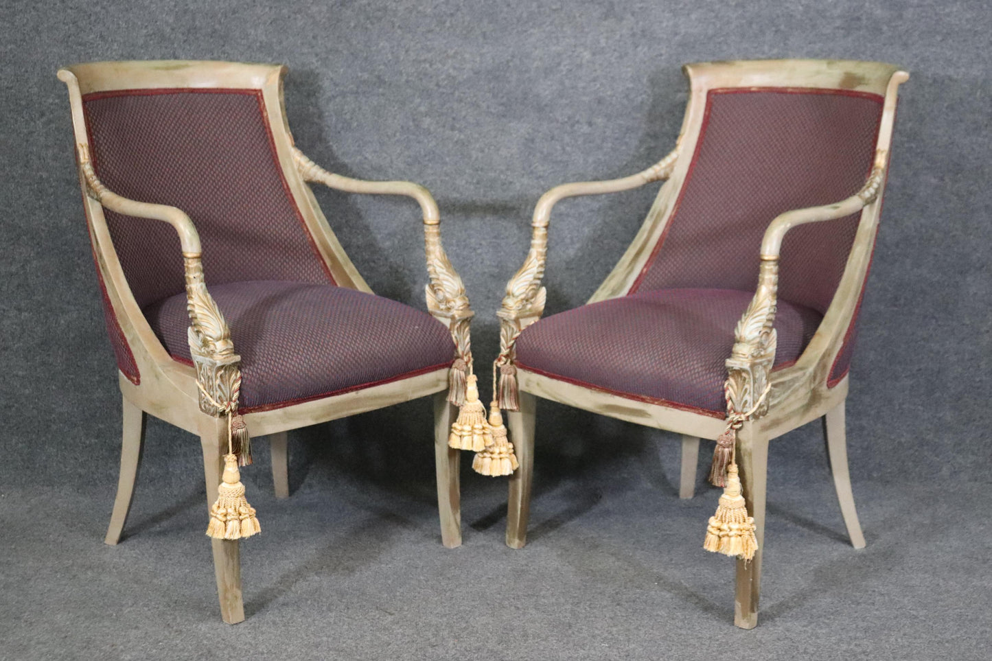 Pair of Paint Decorated and Gilded Dolphin Head Neoclassical Bergere Chairs