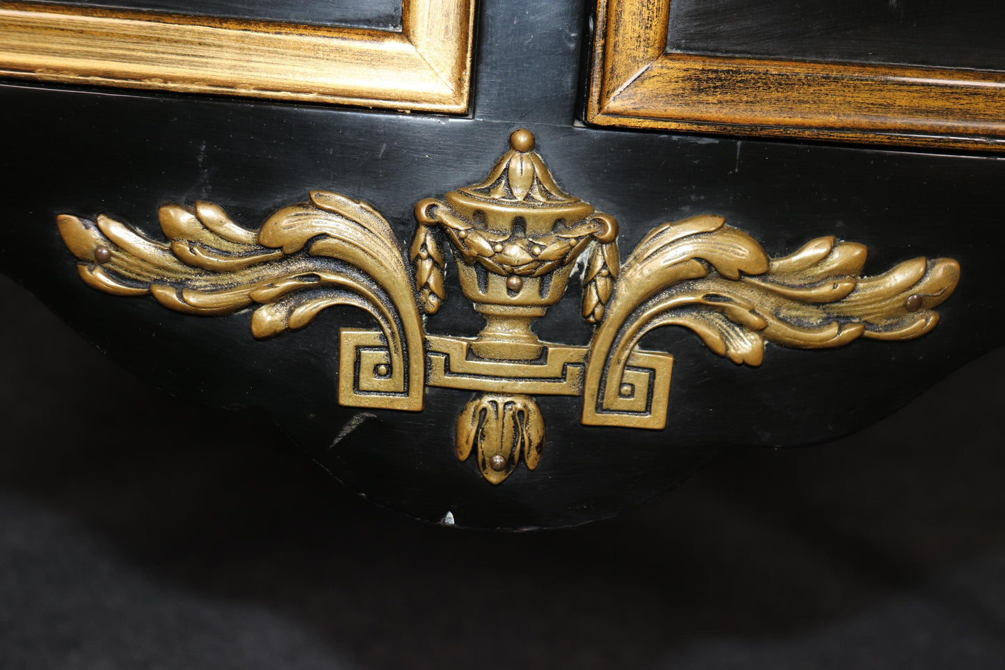 Matched Pair of Maison Jansen style Ebonized and Gilded Louis XV Commodes