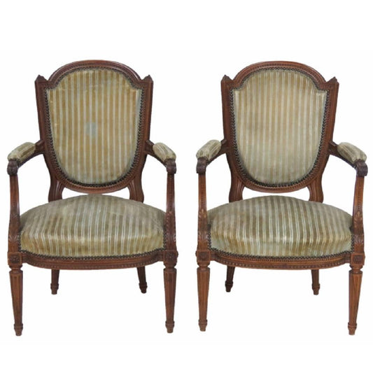 Pair of Antique Louis XVI Style Carved Walnut Fauteuils