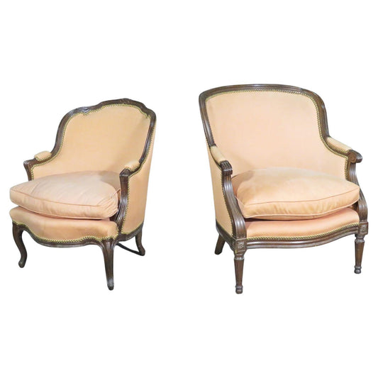 Mated Pair Similarly Upholstered French Carved Walnut Louis Bergere Chairs